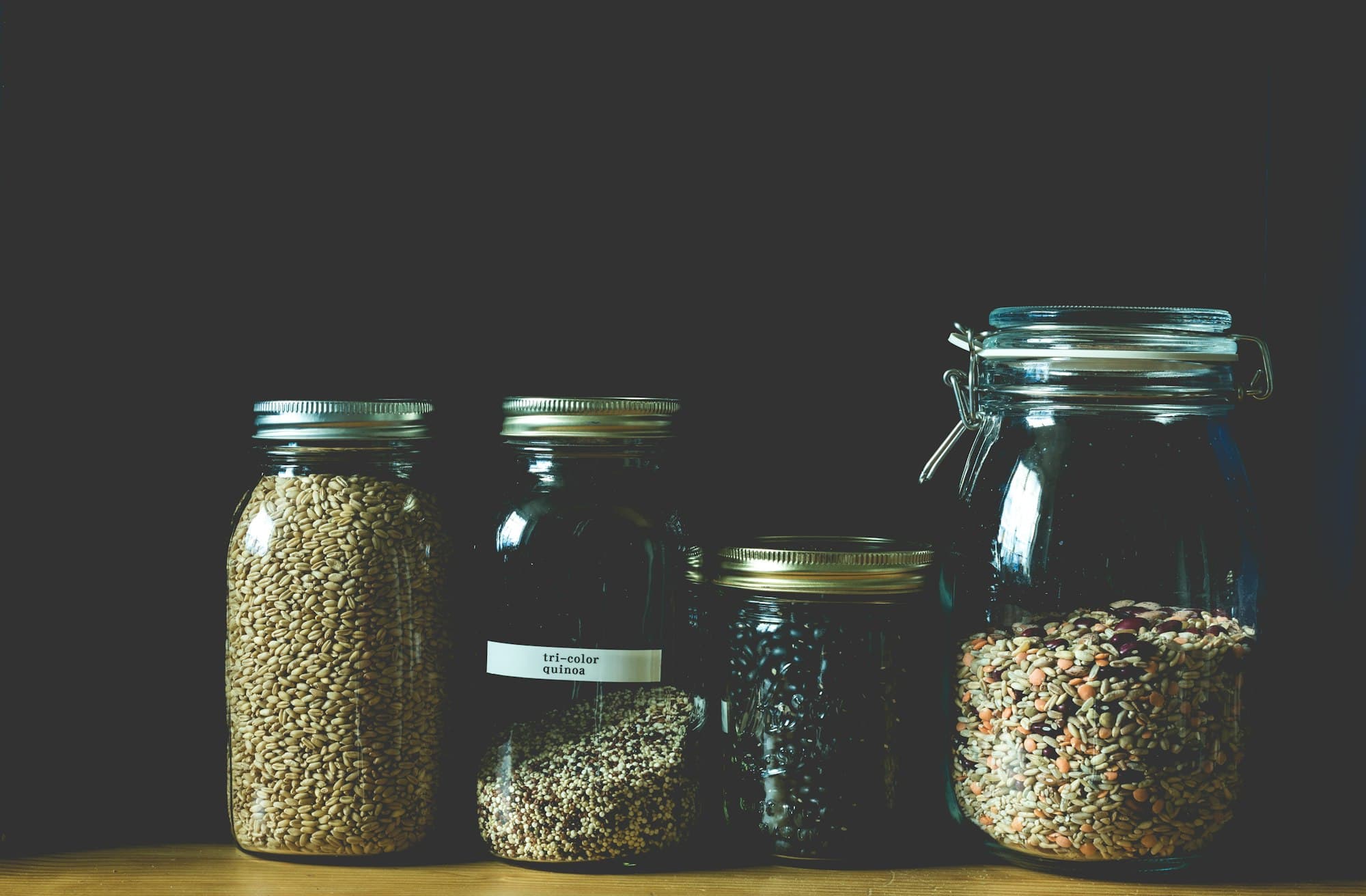 Glass jars filled with grains and pulses